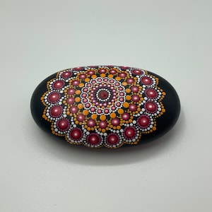 Acrylic mandala painting on natural pebbles. Paperweight, napkin holder, meditation mandala, decorative object.