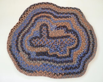 Hand made braided rug