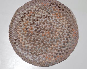 Hand made braided rug, round, beige, one of a kind