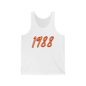 May include: White vest top featuring the number "1988" in a red and yellow script font. The sleeveless top is made of a soft material, suitable for casual wear.