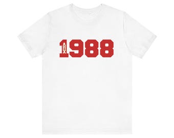 Lambda Pi Chi - 1988 Unisex Jersey Short Sleeve Tee