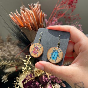 Cute bugs hand painted earrings, with insect design, goth and witchy, boho, oddity and curiosity.