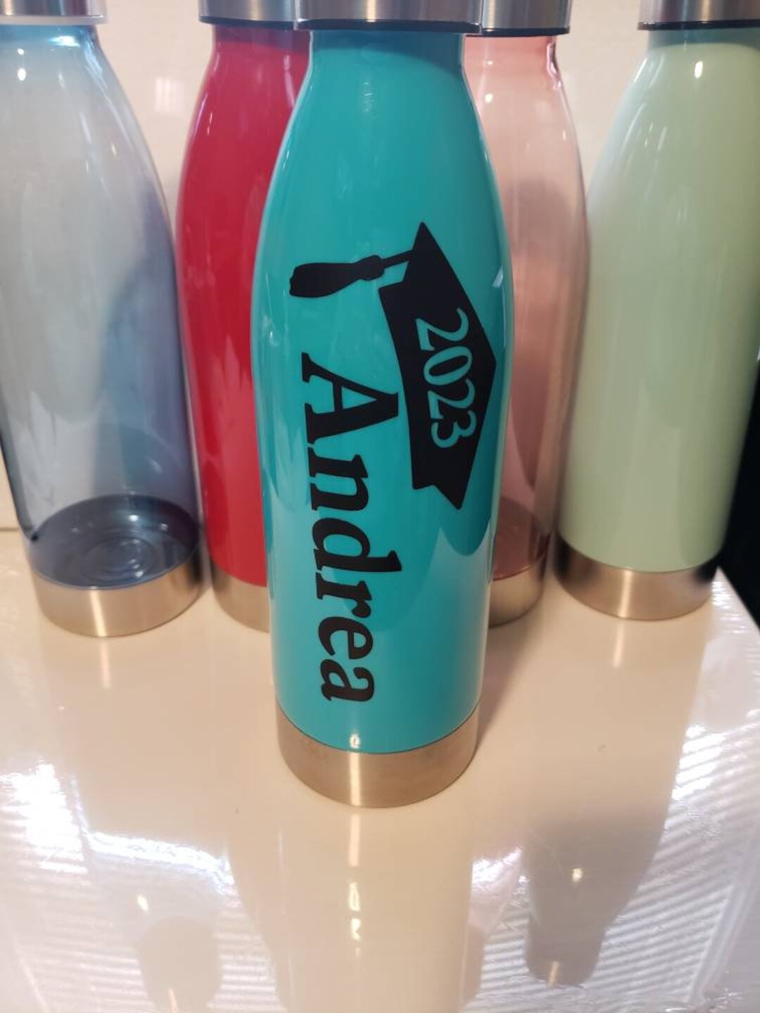 2023-graduate-22-oz-water-bottle-with-name-in-variety-of-colors