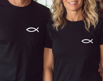 May include: Two black short-sleeved crew neck t-shirts, each featuring a small white Christian fish symbol printed on the upper left chest area. The shirts are made of a solid black fabric and have a standard fit with short sleeves.