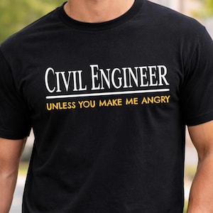 May include: Black crew neck t-shirt with the text "Civil Engineer" in white, above the text "UNLESS YOU MAKE ME ANGRY" in yellow. The shirt is made of a soft material.