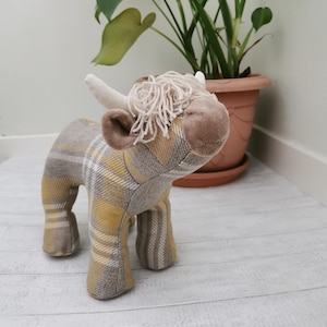 Highland cow sewing pattern with photo and video tutorial suitable for making plush toys and memory bears