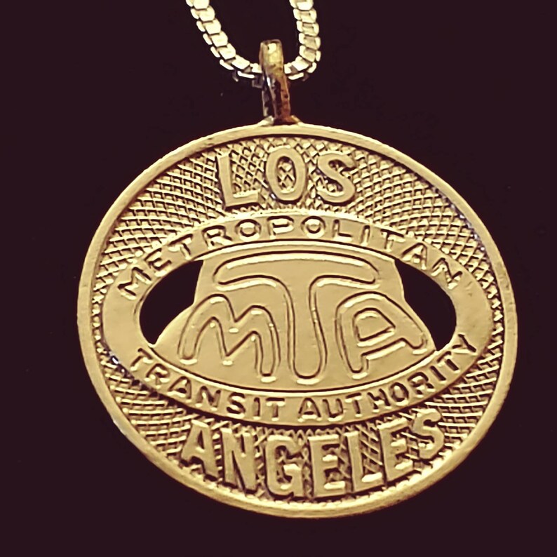 upcycle vintage coin jewelry Los Angeles M.T.A. token L.A on 20Sterling Silver box chain Coin Pendant California jewelry