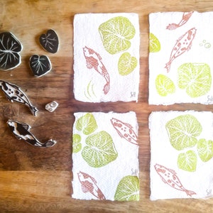 Koi pond | original hand made lino print on hand made cotton paper | collage | fish | vissen | vijver |
