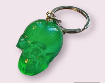 Small sized green  resin skull keychain with glitter