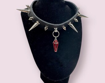 Black Punk Goth upcycled leather spiked coker with crimson enamel coffin charm adjustable.