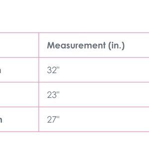May include: A table of measurements for a hoodie dress. The measurements are: Top to Bottom 32 inches, Side to Side 23 inches, and Sleeve Length 27 inches. The text "Hoodie Dress" is at the top of the image.