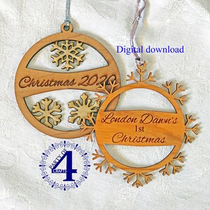 May include: Two wooden Christmas ornaments with snowflake designs. One ornament says "Christmas 2020" and the other says "London Dawn's 1st Christmas".