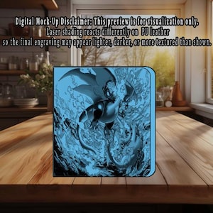 May include: A blue PU leather notebook featuring a detailed illustration of a dragon-like creature in a dynamic pose. The artwork is set against a backdrop of stylized flames and water. The text "Digital Mock-Up Disclaimer" is visible.