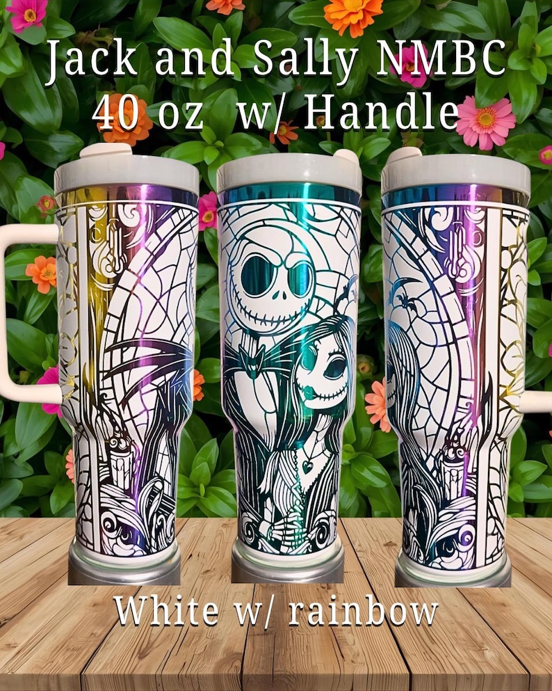 May include: Three white 40 oz tumblers with rainbow accents and the text "Jack and Sally NMBC". Each tumbler features a different stained-glass style design with Jack and Sally characters. The tumblers have handles and white lids.