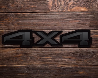 May include: Black 4x4 lettering on a dark brown wood background.