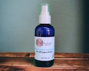 May include: A blue bottle of leave-in conditioner with a white spray top. The label reads "Kabelledinie Hair-Care" and "Infused Leave in Conditioner For All Types of Hair". The bottle is 4 oz.