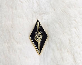 Sword in heart enamel pin