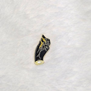 Hand enamel pin gold and black