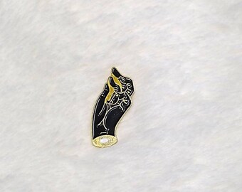 Hand enamel pin gold and black