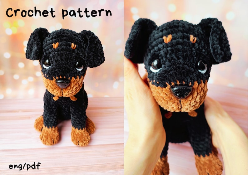 May include: Crochet pattern for a black and brown Rottweiler dog amigurumi. The dog is sitting with its paws tucked under its body. The pattern is available in English and PDF format.
