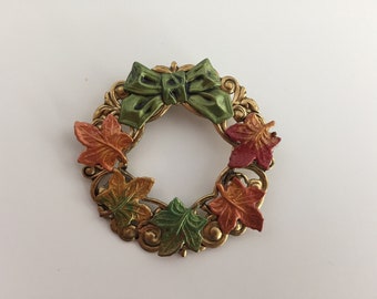 Autumn leaf wreath pin in rich Fall colors. Superior brooch mechanism.