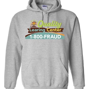 May include: A gray hooded sweatshirt with a front pocket. The sweatshirt features the text "Quality Learing Center" with a graphic of a building and the phone number 1-800-FRAUD in a colorful design.