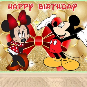 May include: A red and gold birthday backdrop featuring Mickey Mouse and Minnie Mouse. The backdrop has a glittery gold background with red bows and balloons.