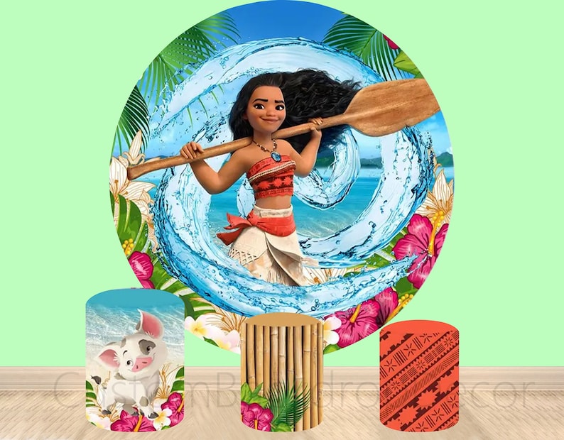 May include: A set of three round cardboard backdrops featuring a tropical island scene with a cartoon character from the movie Moana. The backdrops are decorated with flowers, palm trees, and ocean waves. The character is holding a wooden paddle.