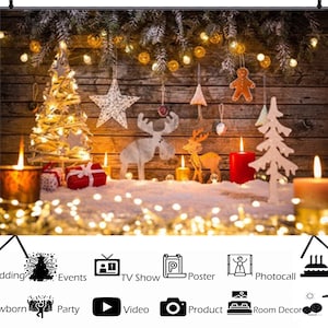 May include: A Christmas backdrop featuring a wooden background with a white Christmas tree, a reindeer, and a gingerbread man. The background is decorated with string lights and snow.