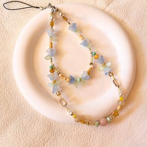 Jolie dragonne pour téléphone portable, fleurs, perles bleues et jaunes, chaîne pour téléphone