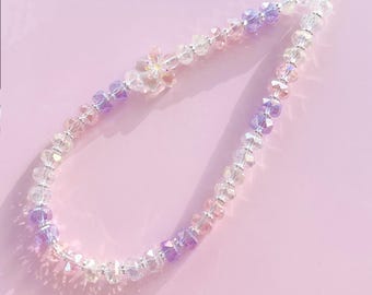 Pulsera con correa para teléfono de perlas de cristal facetadas y diseño de flor de cerezo
