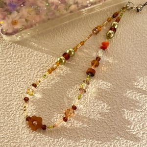 Cadena para pulsera con dije para teléfono Flower Power