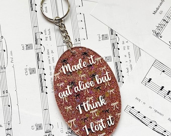 Gracie Abrams 'That's so True' Glitter Keychain: Holographic Bows