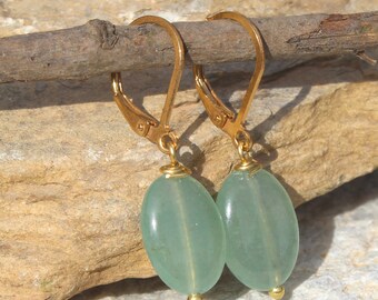 Gold-plated sleeper earrings with a semi-precious green aventurine stone, natural oval green stone