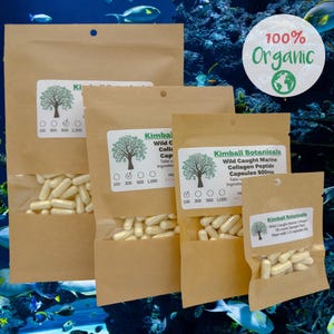 May include: Four brown paper pouches with white capsules inside. The pouches are labeled with the text "Kimball Botanicals" and "Wild Caught Marine Collagen Peptide Capsules 500mg". The pouches are arranged in a pyramid shape with the largest pouch at the bottom and the smallest pouch at the top. The pouches are on a blue and green background with fish.