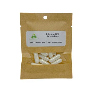 May include: A brown paper pouch with a white label that reads "L-Lysine HCI Sample Pack". The label also includes instructions to take 1 capsule up to 2 times daily between meals. The pouch contains white capsules.