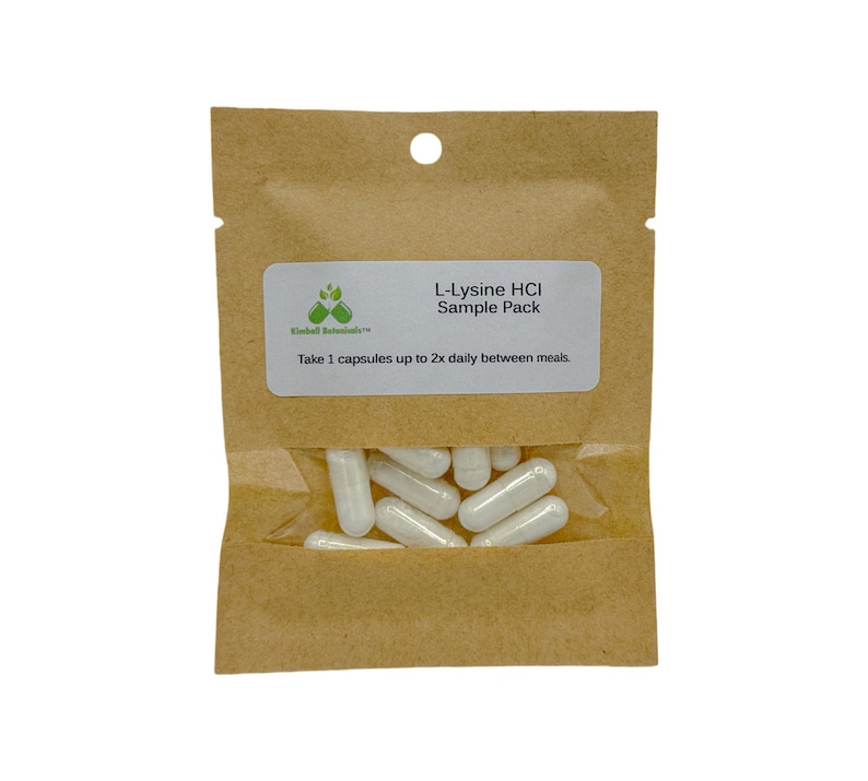 May include: A brown paper pouch with a white label that reads "L-Lysine HCI Sample Pack". The label also includes instructions to take 1 capsule up to 2 times daily between meals. The pouch contains white capsules.