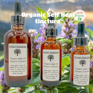 May include: Three amber glass bottles of "Organic Heal-All Glycerin Tincture" with black droppers. Each bottle has a white label with the "Kimball Botanicals" logo and product information. The image includes the text "Organic Self Heal tincture" and a "100% Organic" logo.