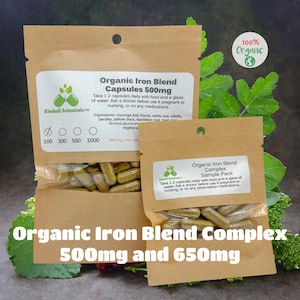 May include: Two brown paper pouches of organic iron blend capsules. One pouch is labeled 500mg, the other is a sample pack. The text reads "Organic Iron Blend Complex 500mg and 650mg". The image also includes a "100% Organic" logo.