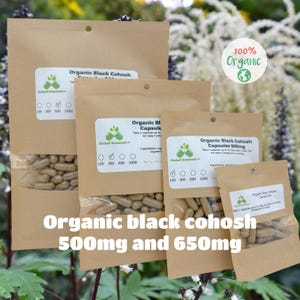 May include: Three brown paper bags with different sizes containing organic black cohosh capsules. The bags have a label with the text "Organic Black Cohosh Capsules" and the text "100% Organic".