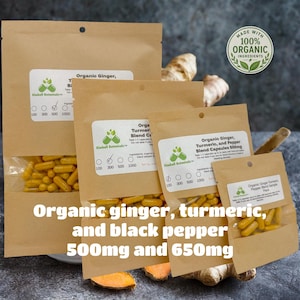 May include: Four brown paper pouches containing yellow capsules labeled Organic Ginger, Turmeric, and Pepper Blend. Each pouch features a clear window, a Kimball Botanicals logo, and a circular seal stating Made with 100% Organic Ingredients.