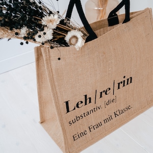 Jutetasche Lehrerin Jute mit Aufdruck "Eine Frau mit Klasse", schwarze Henkel, Abschiedsgeschenk