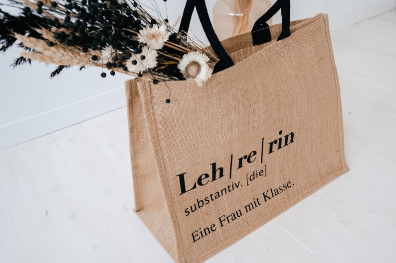 Jutetasche Lehrerin Jute mit Aufdruck "Eine Frau mit Klasse", schwarze Henkel, Abschiedsgeschenk
