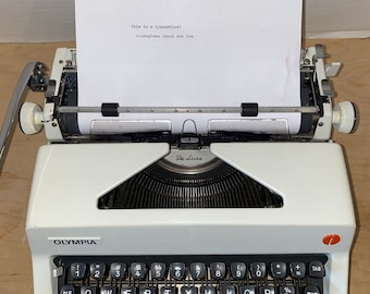 Vintage 1971 Olympia SM9 De Luxe Portable Typewriter w/ Black Case