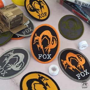 Metal Gear - Embroidered Patch - FOX - XOF - Videogame Emblem - Iron On/Hook & Loop - Premium Embroidery