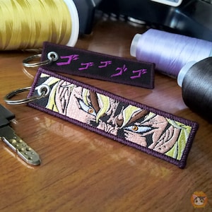 Key Tag - Brodé des deux côtés - Personnage Anime - Jet Tag