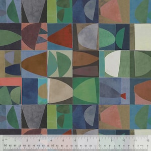May include: Abstract geometric pattern featuring a grid of colorful shapes. The design incorporates squares with semi-circular and triangular forms in shades of green, blue, brown, and red. A ruler with inch and centimeter markings is at the bottom.