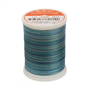 May include: A spool of Sulky 100% cotton mercerized thread in a blue, green, and white striped pattern. The spool is labeled with the brand name "Sulky", the thread number "713", and the color number "4014".