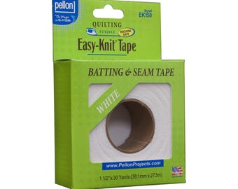 May include: A green and white box of Pellon Easy-Knit Tape. The box features the text "Easy-Knit Tape", "Batting & Seam Tape", and "White". The tape roll is visible through a window. The box contains 1 1/2" x 30 Yards (38.1mm x 27.3m) of tape.