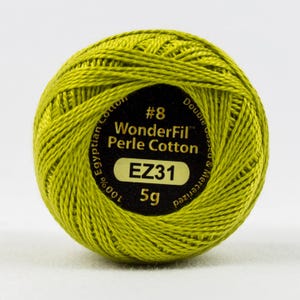 May include: A green ball of WonderFil Perle Cotton embroidery thread, size #8, with a black label that reads "WonderFil Perle Cotton EZ31 5g 100% Egyptian Cotton Double Gassed & Mercerized".